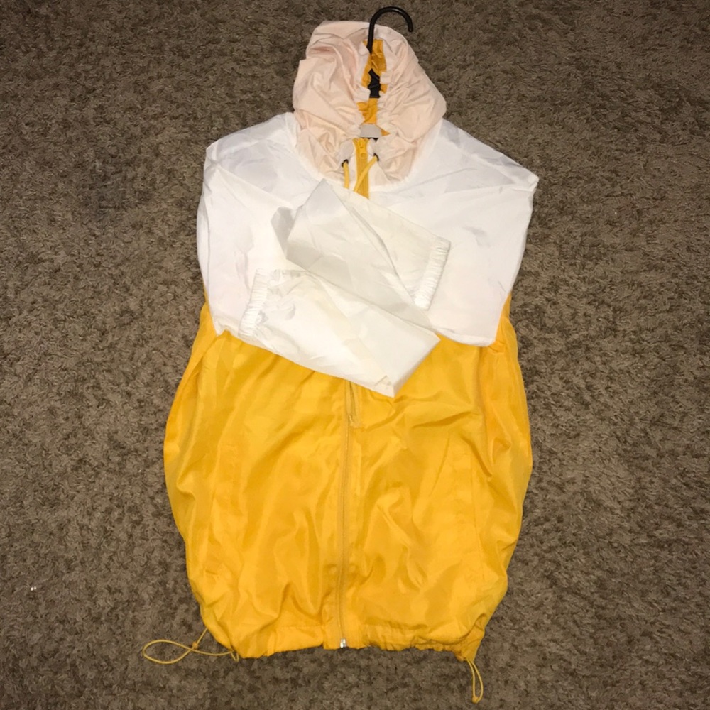 White & Yellow windbreaker jacket.